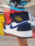 کفش بسکتبال نایکی دخترانه ایر جردن ۱ ساقدار مشکی سرمه ایNike Air Jordan